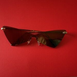 Rimless Cat-Eye Sunglasses — Black Lenses with Gold Accents